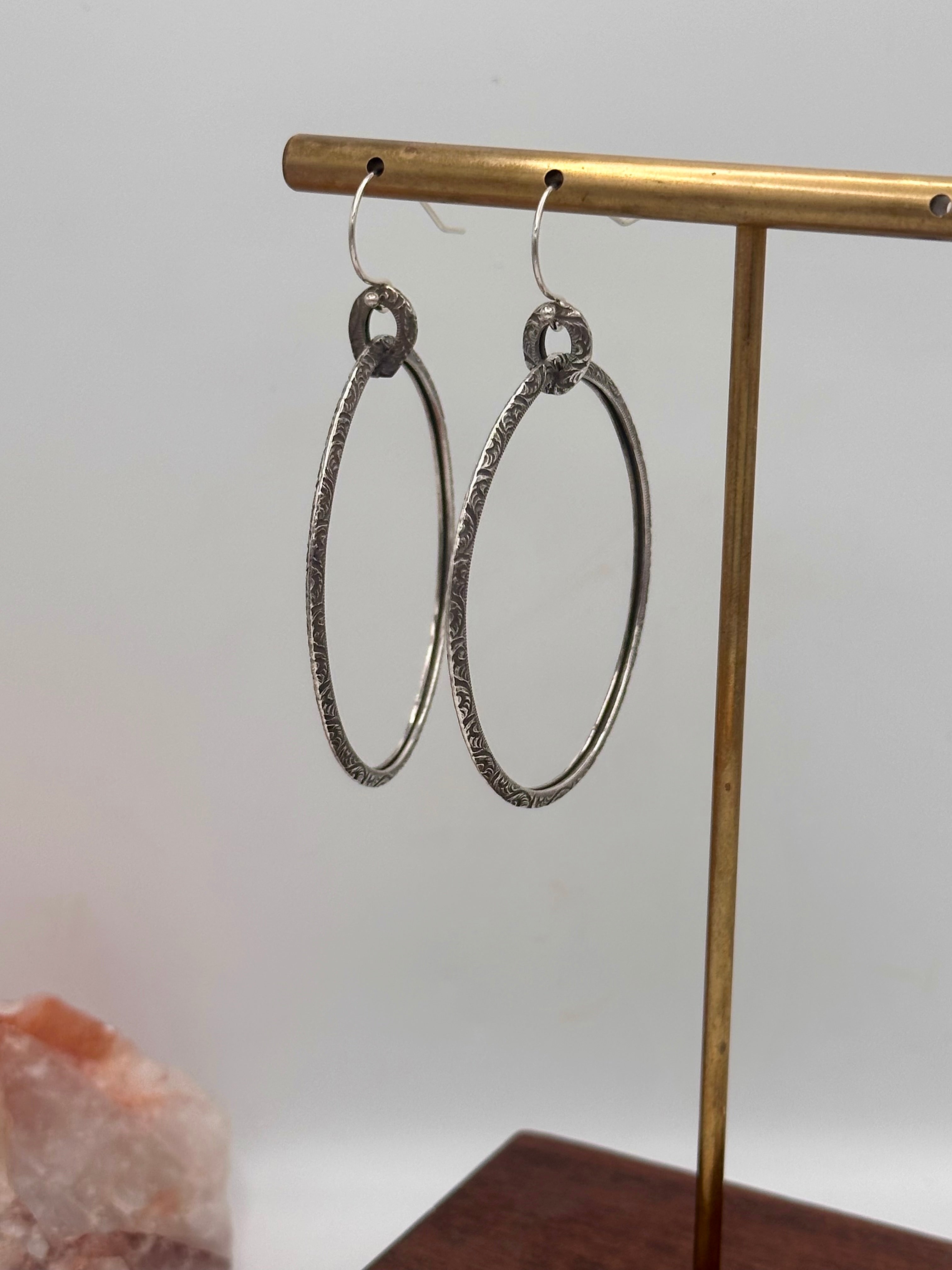 Silver floral dangle hoops