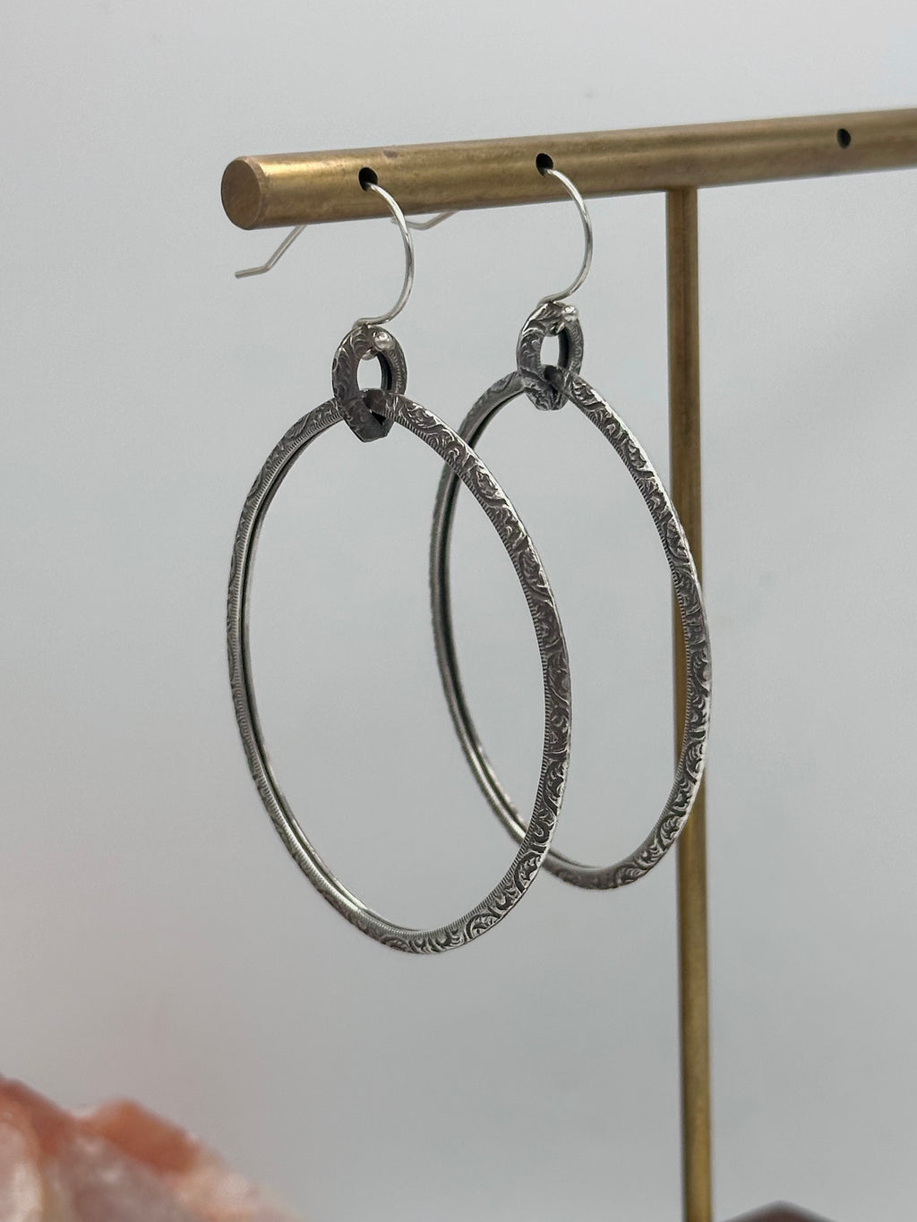 Silver floral dangle hoops